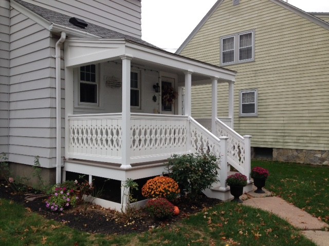 This is an example of a small victorian back veranda in Bridgeport.