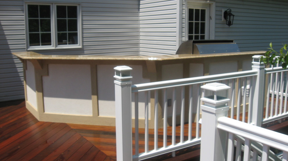 Mid-sized classic porch idea in New York with decking