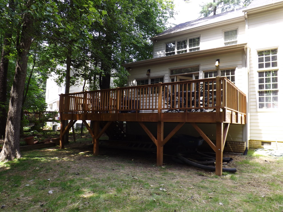 This is an example of a traditional porch design in Raleigh.