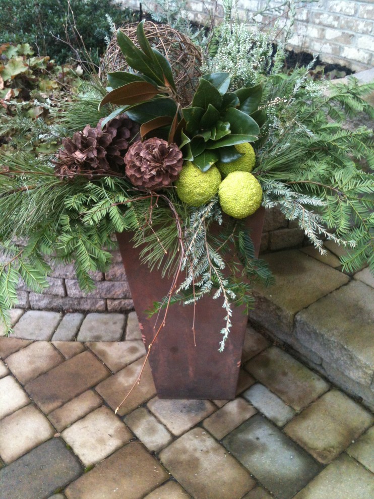 Immagine di un piccolo portico boho chic davanti casa con un giardino in vaso
