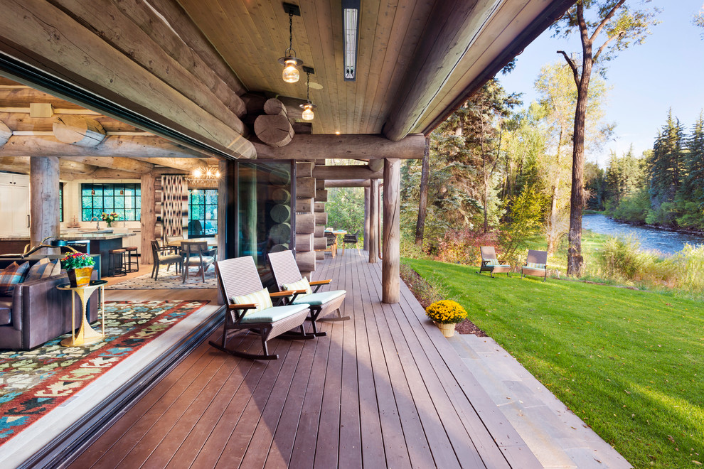 Idéer för en rustik veranda, med trädäck och takförlängning