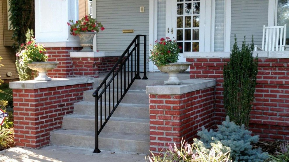 Mid-sized arts and crafts front porch idea in Wichita