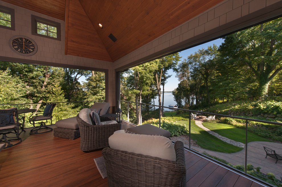 Design ideas for a large nautical back screened veranda in Minneapolis with decking and a roof extension.