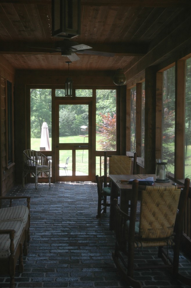 This is an example of a rustic porch design in Indianapolis.