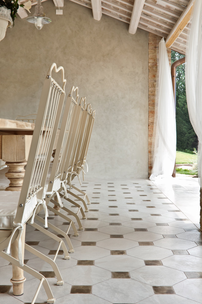 Inspiration for a farmhouse tile porch remodel in Other