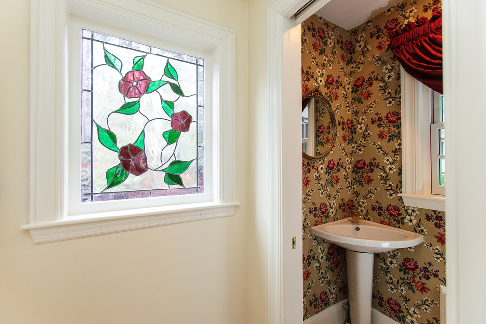 Small elegant powder room photo in Boston with multicolored walls and a pedestal sink