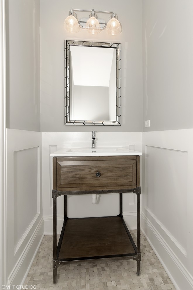 Small traditional cloakroom in Chicago with freestanding cabinets, distressed cabinets, grey tiles, grey walls, marble flooring and a submerged sink.