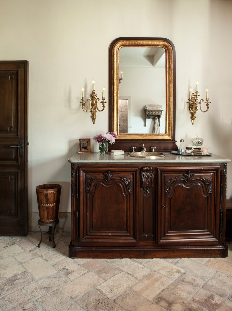 Powder room - eclectic brick floor and beige floor powder room idea in Wilmington with furniture-like cabinets, dark wood cabinets, white walls and an integrated sink