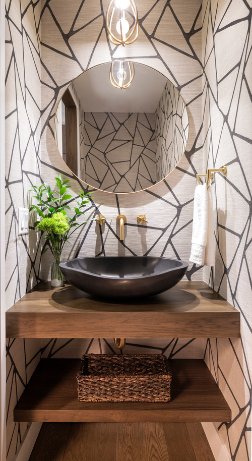 Bold Geometrics: Black and White Bathroom Wallpaper Ideas with Brass Accents