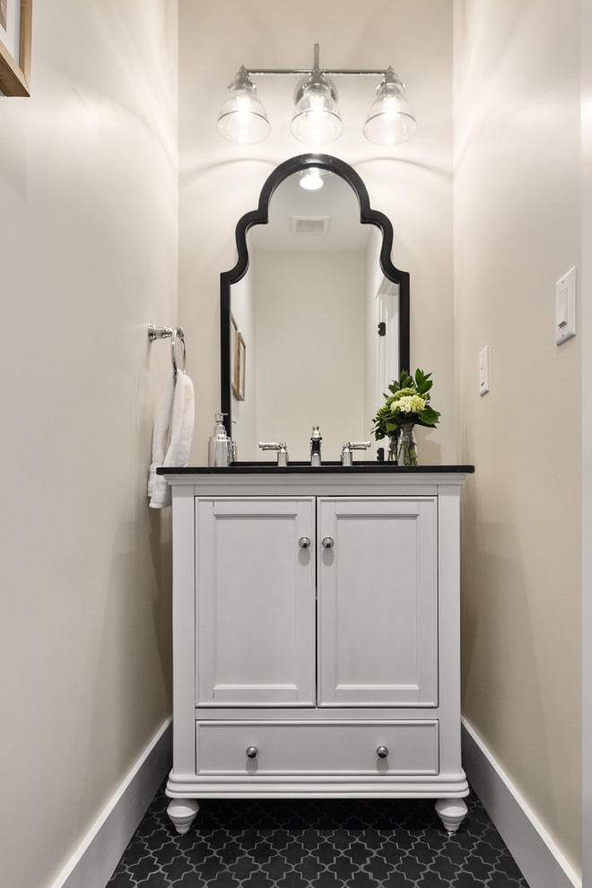 Small traditional cloakroom in Salt Lake City with beaded cabinets, white cabinets, beige walls, porcelain flooring, a submerged sink, black floors and black worktops.