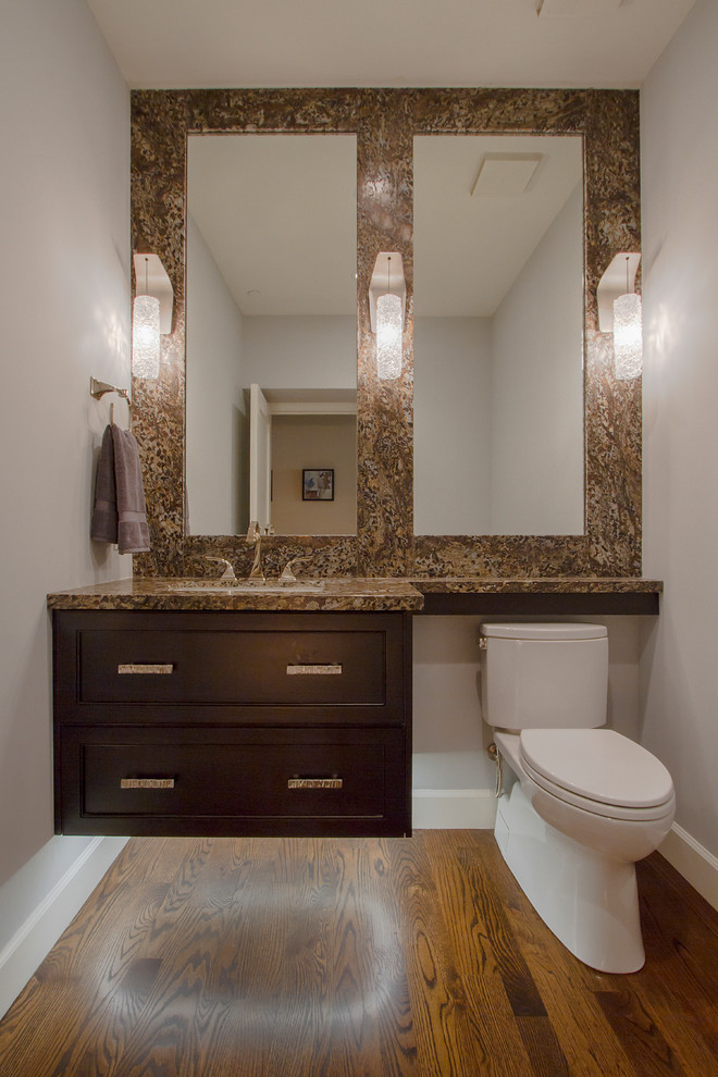 Design ideas for a large contemporary cloakroom in Phoenix with shaker cabinets, brown cabinets, a two-piece toilet, grey walls, medium hardwood flooring, a submerged sink, granite worktops, brown floors, brown tiles, stone slabs and brown worktops.