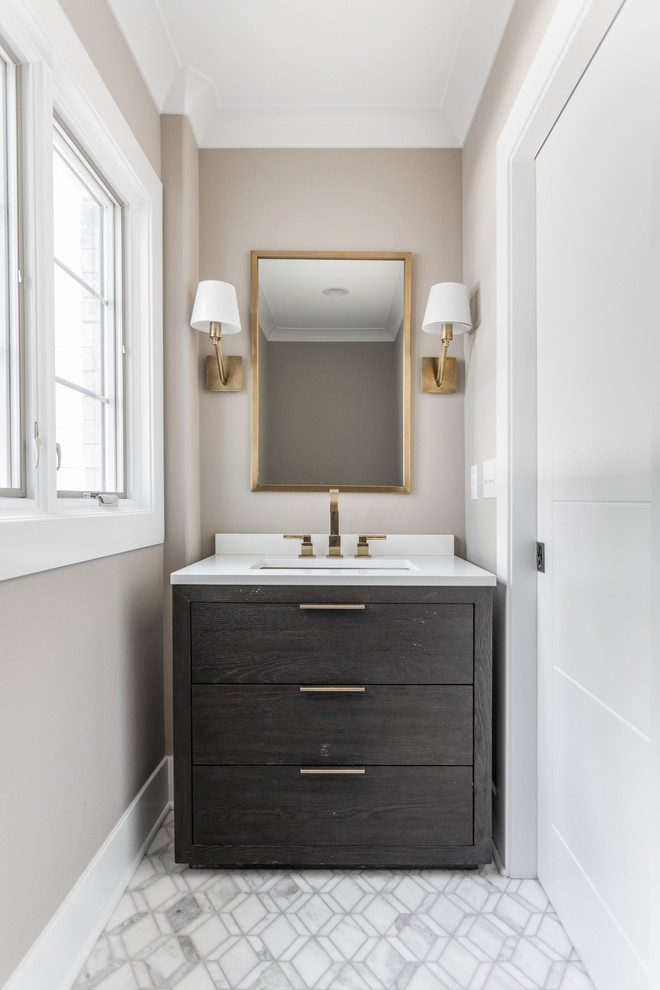 This is an example of a medium sized traditional cloakroom in Indianapolis with grey walls, marble flooring, an integrated sink and grey floors.