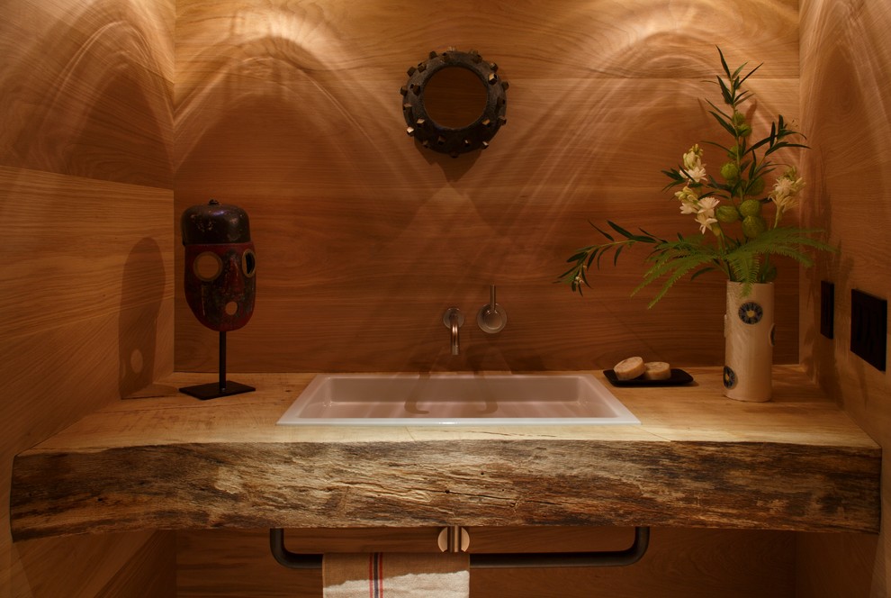 Inspiration for a contemporary powder room remodel in San Francisco with a drop-in sink