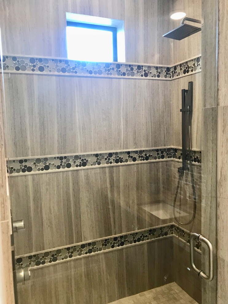 Inspiration for a mid-sized contemporary multicolored tile ceramic tile and beige floor powder room remodel in Other with recessed-panel cabinets, brown cabinets, beige walls and an integrated sink