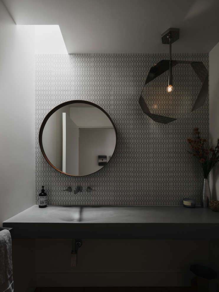 Photo of a retro cloakroom in Phoenix with grey tiles, mosaic tiles, concrete worktops and a floating vanity unit.