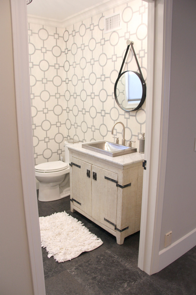 Inspiration for a transitional powder room remodel in Orange County