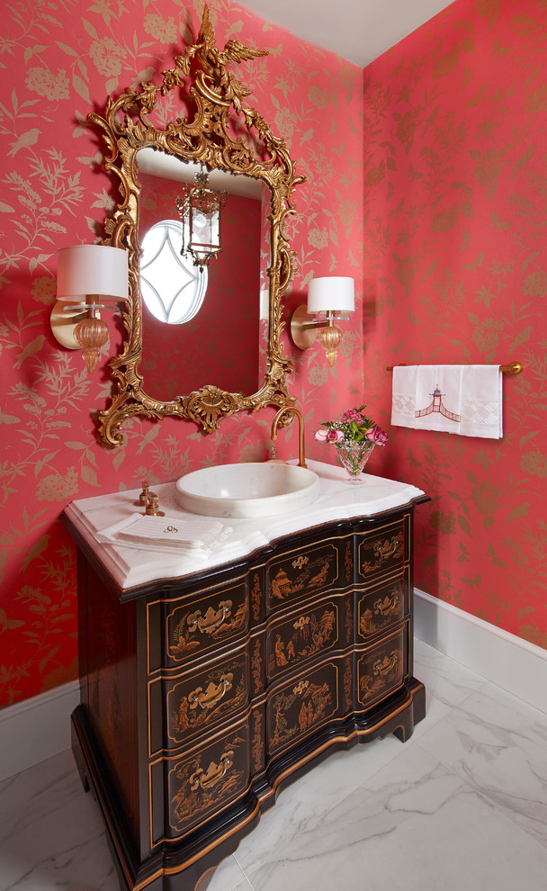 This is an example of a medium sized victorian cloakroom in Baltimore with freestanding cabinets, black cabinets, red walls, porcelain flooring, a vessel sink, marble worktops, white floors and white worktops.