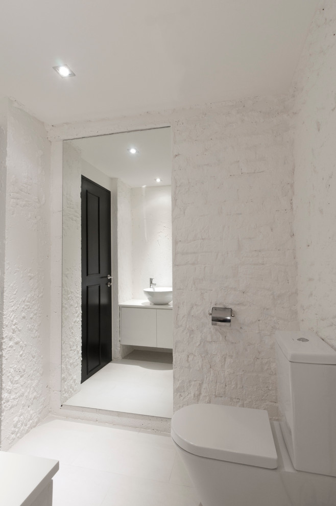 Design ideas for an urban cloakroom in Singapore with a vessel sink.