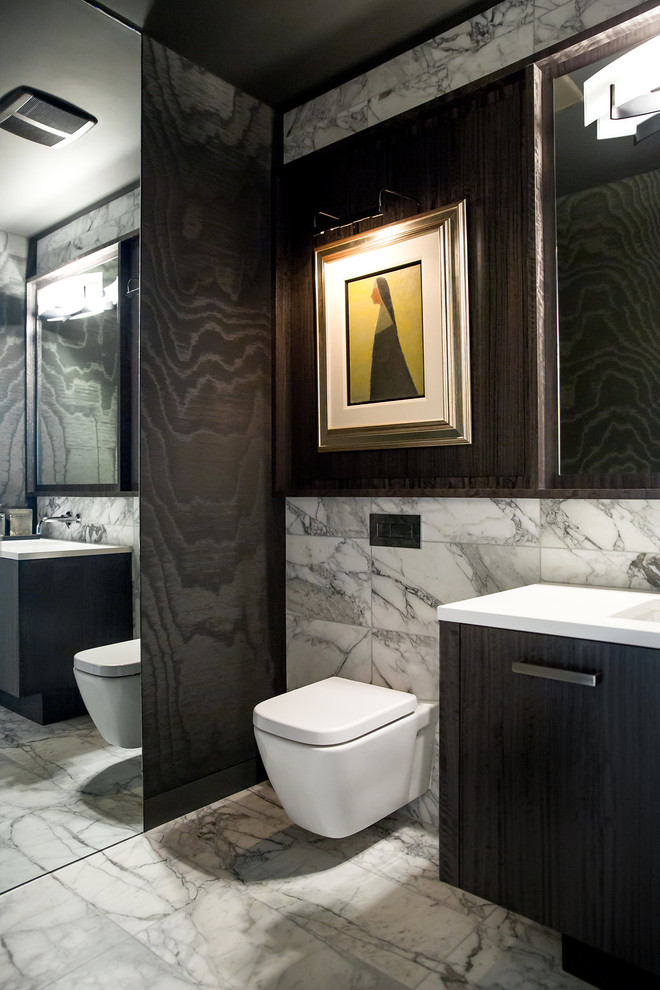 Example of a small minimalist white tile and marble tile marble floor and white floor powder room design in Vancouver with flat-panel cabinets, dark wood cabinets, a wall-mount toilet, black walls, an undermount sink and quartz countertops