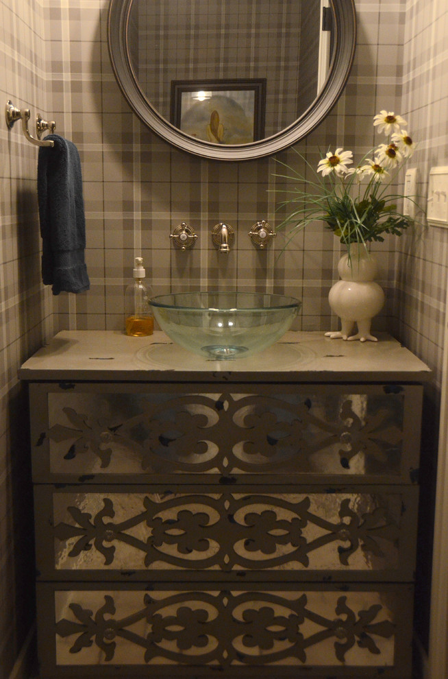 Inspiration for a small beach style cloakroom in Grand Rapids with a vessel sink, freestanding cabinets, wooden worktops, grey walls, distressed cabinets, multi-coloured tiles and medium hardwood flooring.