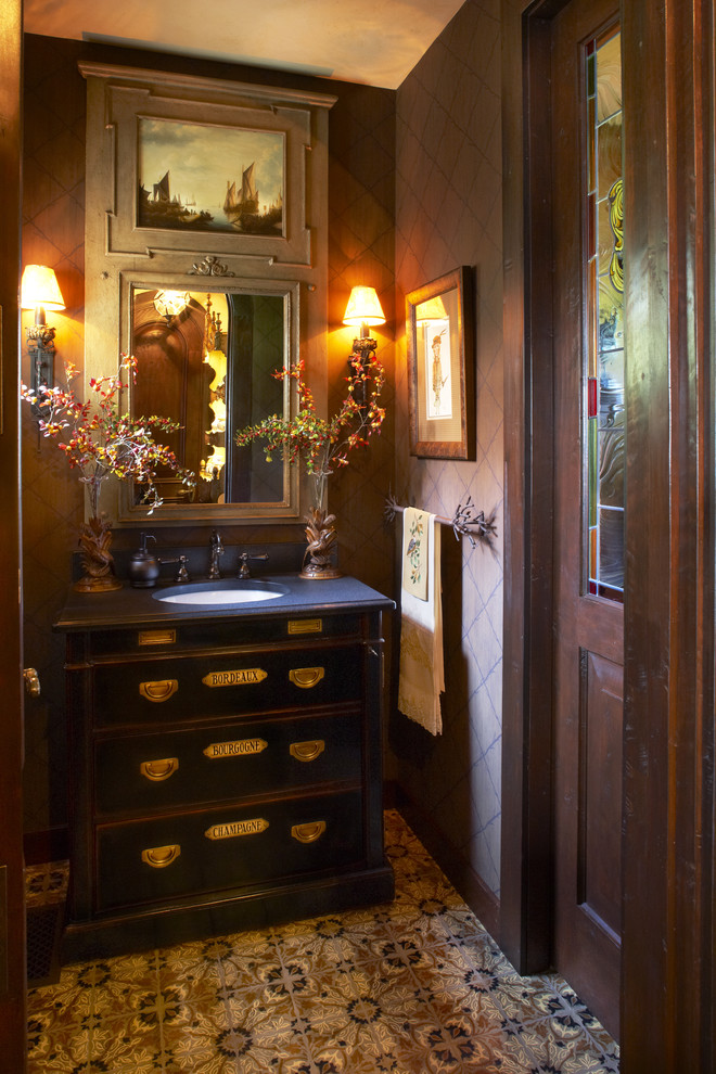 Inspiration for a timeless beige tile powder room remodel in Minneapolis with an undermount sink, furniture-like cabinets and blue countertops