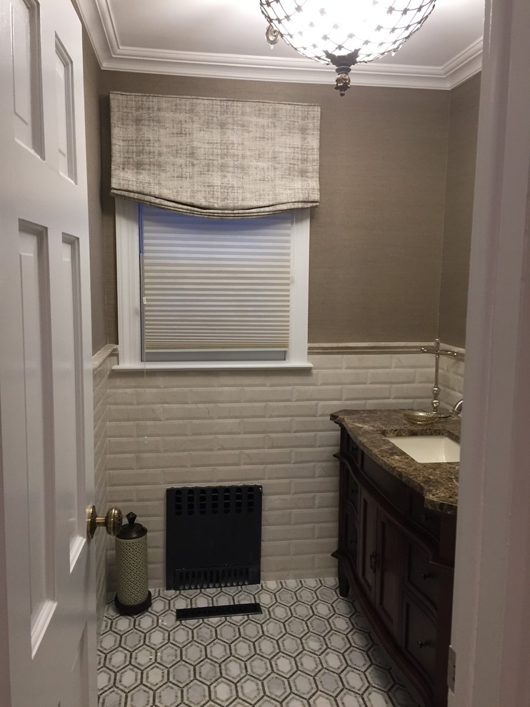 Photo of a medium sized traditional cloakroom in New York with shaker cabinets, dark wood cabinets, white tiles, metro tiles, grey walls, porcelain flooring, a submerged sink, quartz worktops and grey floors.