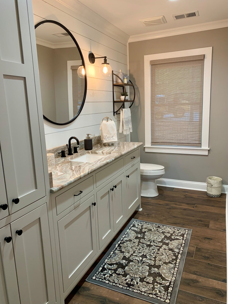 Powder room - mid-sized cottage powder room idea in Atlanta with gray cabinets, quartzite countertops and multicolored countertops