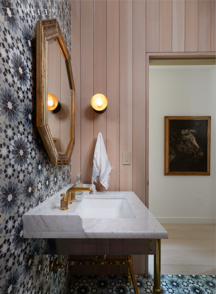 Inspiration for a contemporary cloakroom in Austin with freestanding cabinets, brown cabinets, multi-coloured tiles, mosaic tiles, brown walls, mosaic tile flooring, a submerged sink, multi-coloured floors and white worktops.