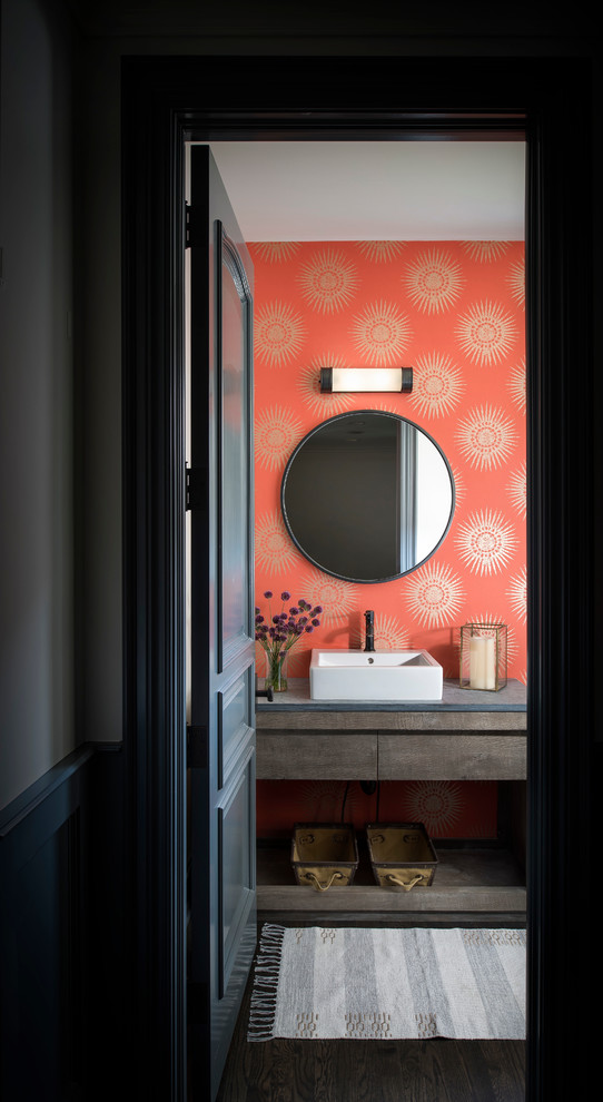 Inspiration for a small classic cloakroom in Detroit with flat-panel cabinets, dark wood cabinets, orange walls, dark hardwood flooring, a vessel sink, brown floors and grey worktops.