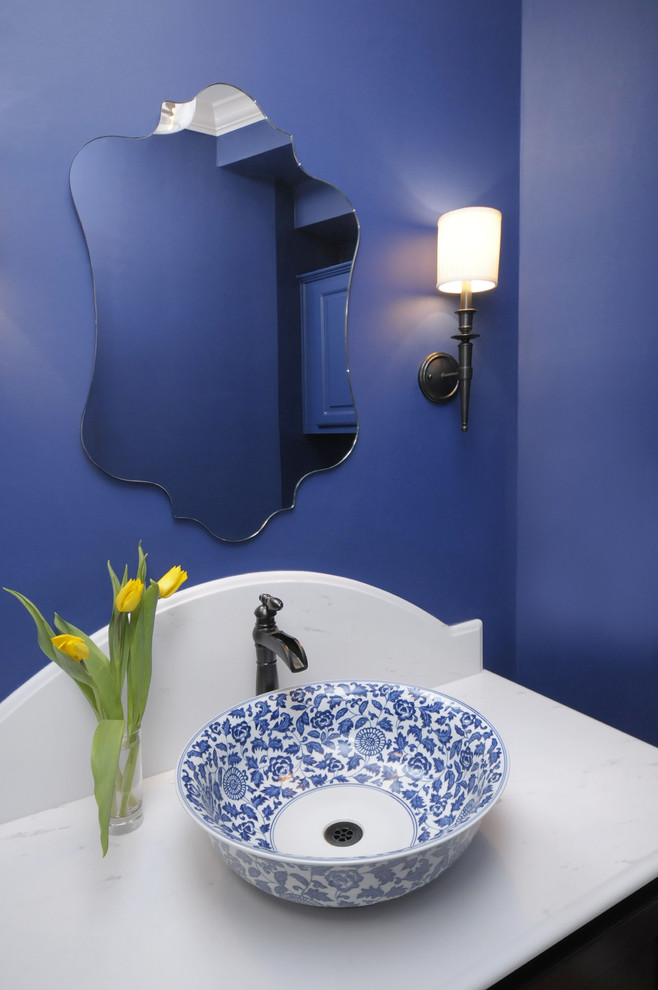 Powder room - traditional powder room idea in Houston with a vessel sink and white countertops