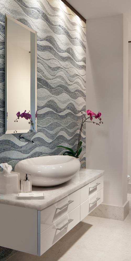 This is an example of a contemporary cloakroom in Miami with a vessel sink.