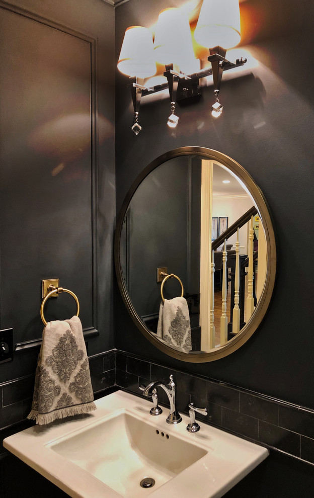 Small traditional cloakroom in Chicago with a two-piece toilet, black tiles, limestone tiles, black walls, porcelain flooring, a pedestal sink and multi-coloured floors.