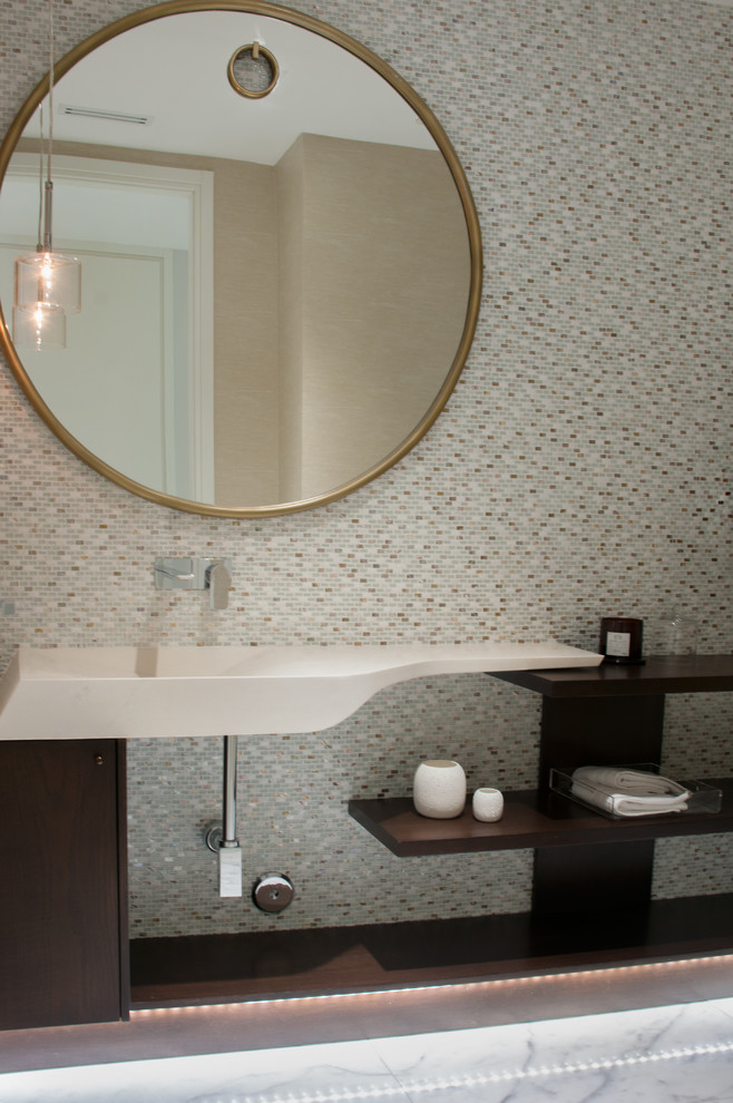 Inspiration for a medium sized modern cloakroom in Miami with open cabinets, dark wood cabinets, a one-piece toilet, beige tiles, mosaic tiles, beige walls, marble flooring, a vessel sink, marble worktops and white floors.