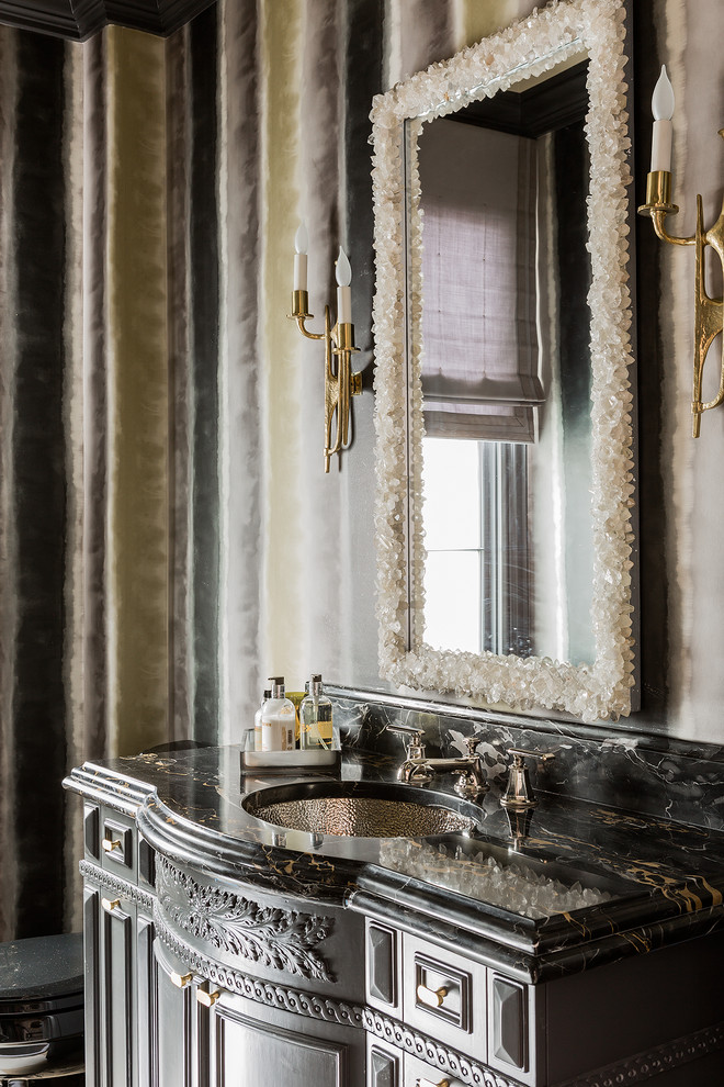 Powder room - mid-sized transitional powder room idea in Boston with gray cabinets, multicolored walls, an undermount sink, furniture-like cabinets and marble countertops