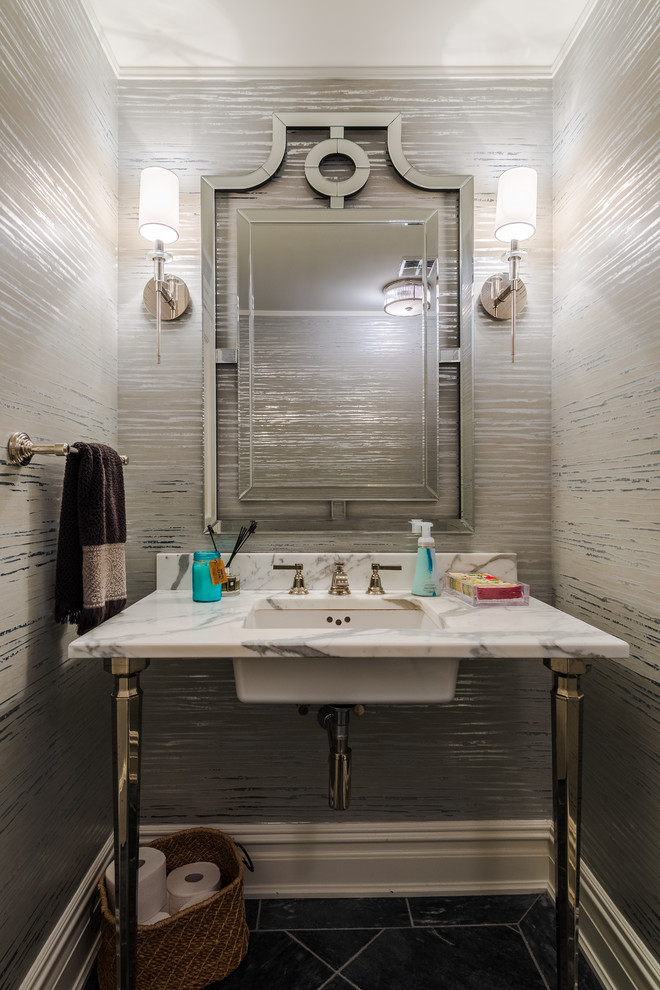 Mid-sized transitional porcelain tile and black floor powder room photo in Chicago with open cabinets, gray walls, an undermount sink, marble countertops and white countertops