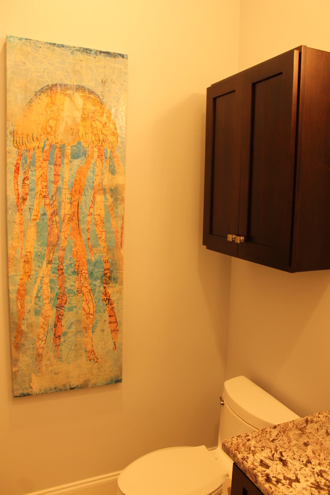 Example of a tuscan powder room design in Miami