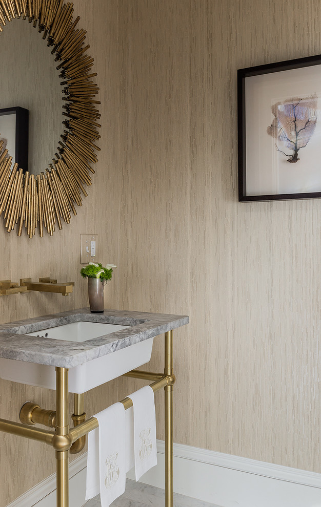 Inspiration for a small transitional powder room remodel in Boston with beige walls and an undermount sink
