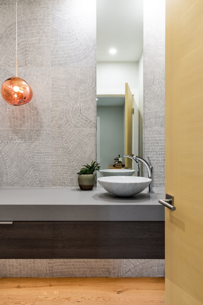 Photo of a medium sized contemporary cloakroom in Vancouver with flat-panel cabinets, dark wood cabinets, grey tiles, engineered stone worktops and grey worktops.
