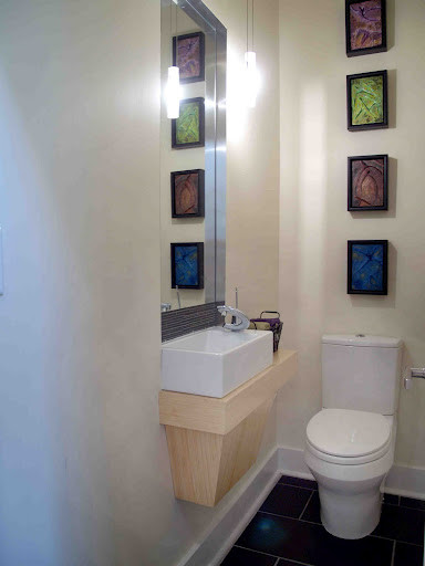 This is an example of a modern cloakroom in Raleigh.