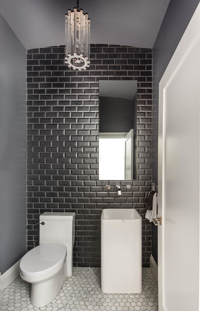 Powder room - small contemporary gray tile, black tile, white tile and subway tile mosaic tile floor powder room idea in Toronto with a pedestal sink, a two-piece toilet and gray walls