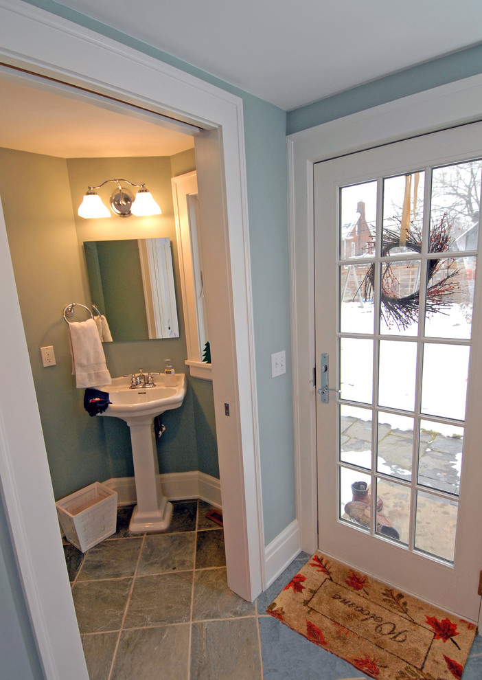 Design ideas for a medium sized classic cloakroom in Cleveland with a pedestal sink, a two-piece toilet, blue walls, slate flooring and grey floors.