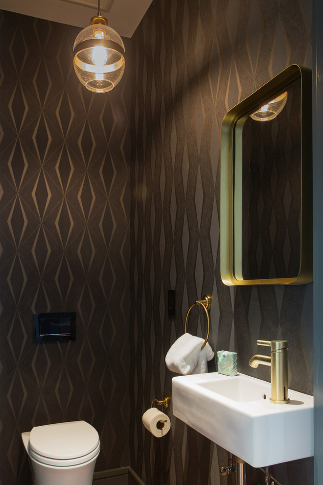 Inspiration for a contemporary cloakroom in San Francisco with a wall-mounted sink and black walls.