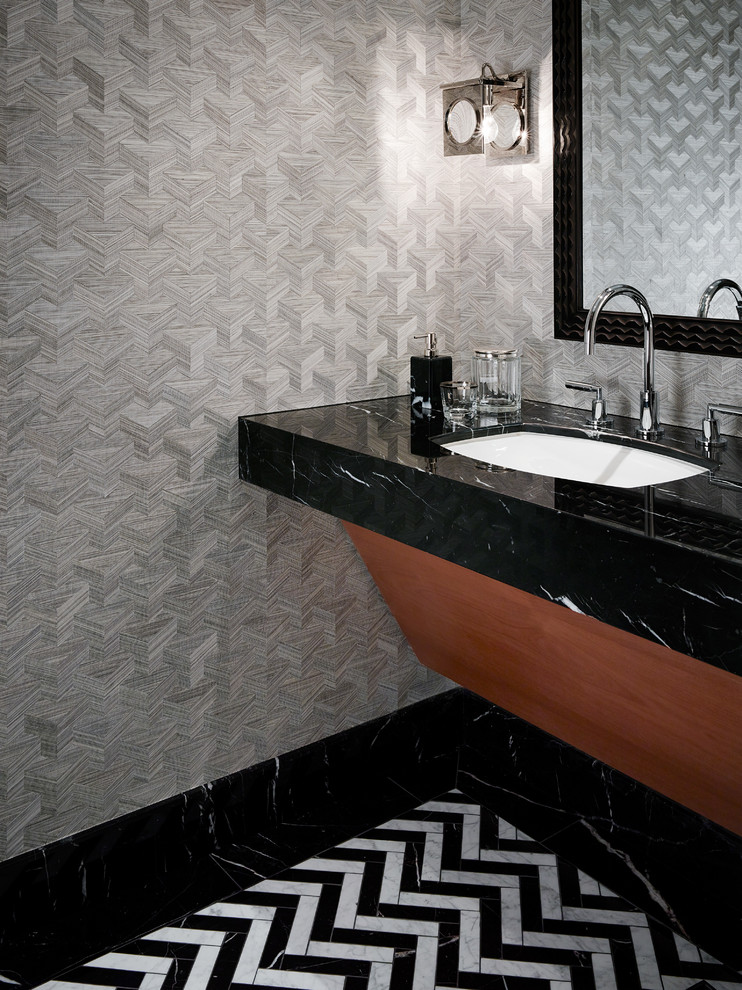Photo of a medium sized contemporary cloakroom in Los Angeles with marble flooring.
