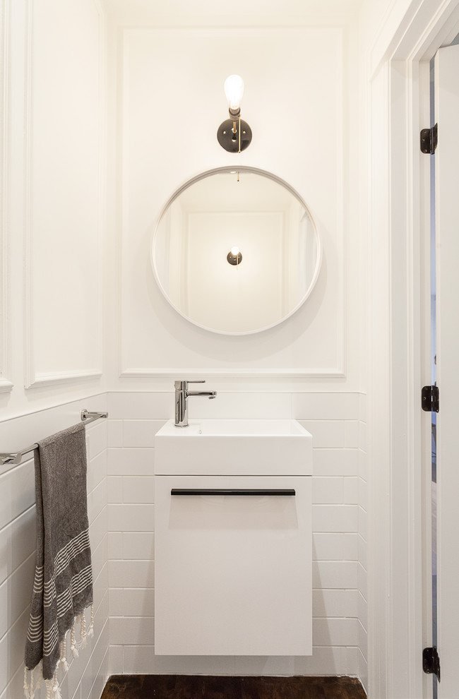 Example of a small trendy white tile and subway tile dark wood floor and brown floor powder room design in Ottawa with an integrated sink, flat-panel cabinets, white cabinets and white walls