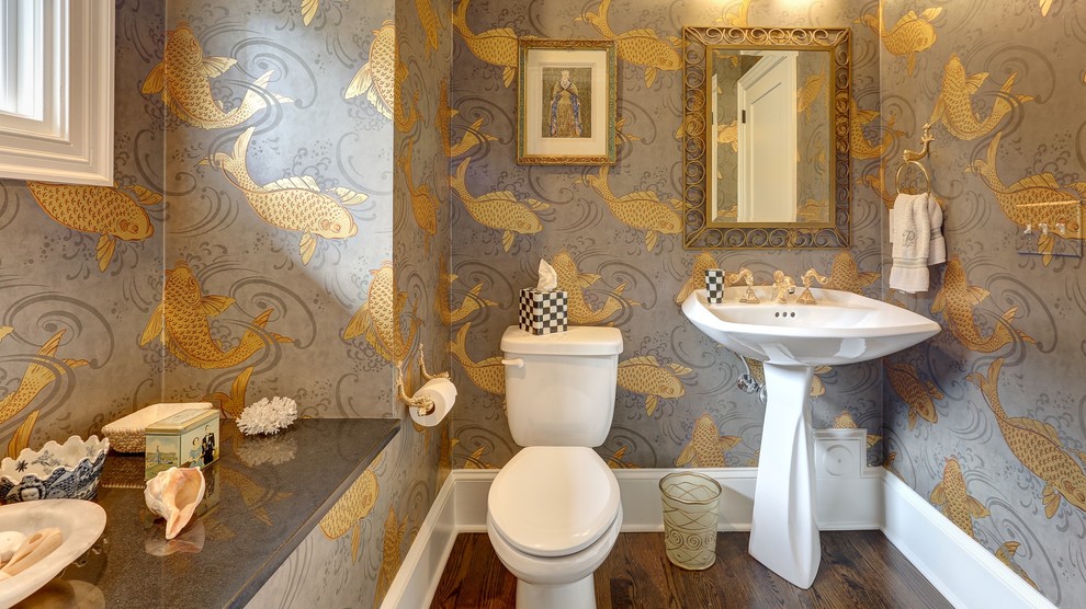 Inspiration for an eclectic dark wood floor powder room remodel in Other with a pedestal sink