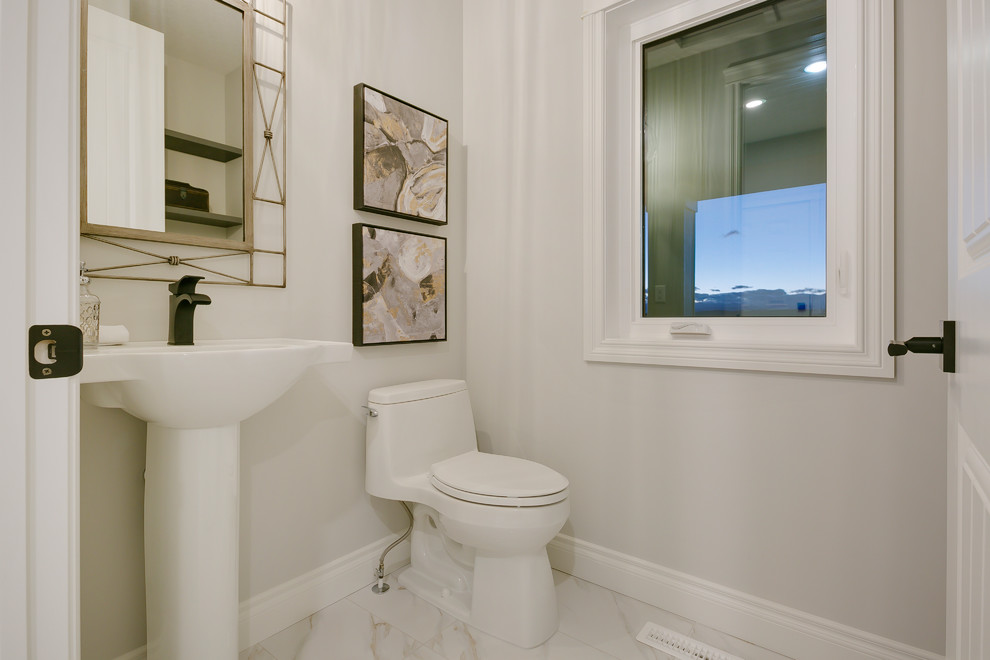 Small classic cloakroom in Calgary with shaker cabinets, grey cabinets, a two-piece toilet, white tiles, grey walls, a pedestal sink, quartz worktops, white floors and white worktops.