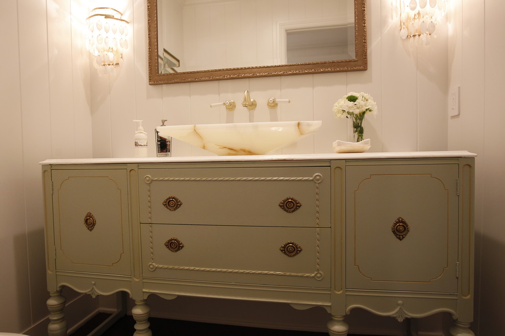Inspiration for a timeless powder room remodel in Orange County with marble countertops