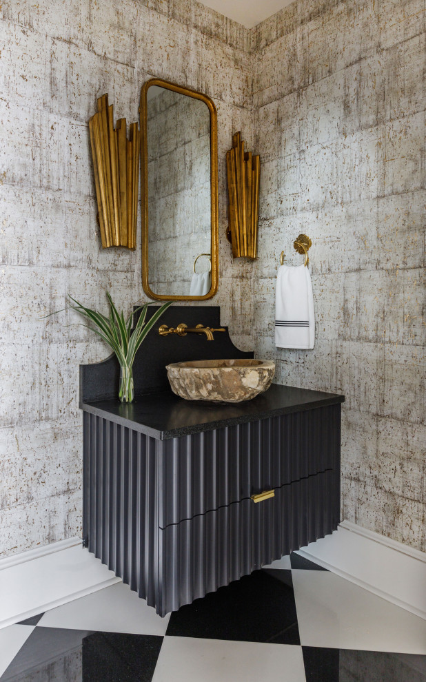 This is an example of a mediterranean cloakroom in Jacksonville with freestanding cabinets, black cabinets, a one-piece toilet, ceramic flooring, a vessel sink, soapstone worktops, black worktops, a floating vanity unit and wallpapered walls.