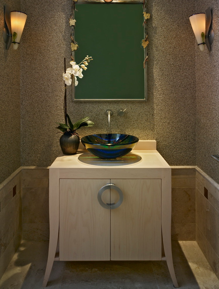 Example of an asian powder room design in Denver with a vessel sink