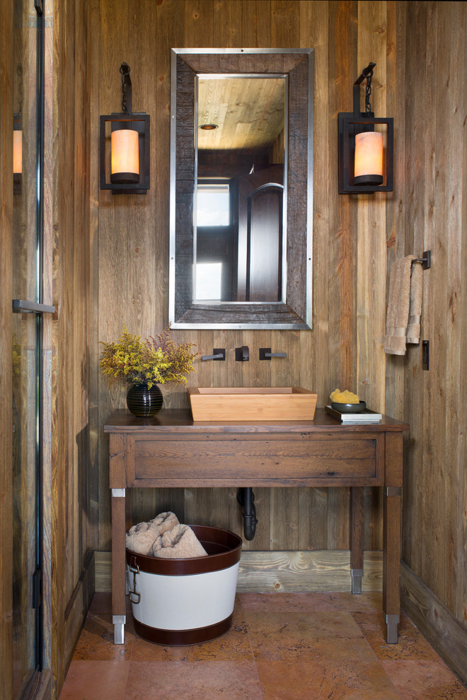 Inspiration for a rustic cloakroom in Denver with a vessel sink.